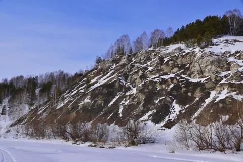 Snow-covered gypsum rocks of Mount Ledyanaya in the city of Kungur near the S Stock Photos