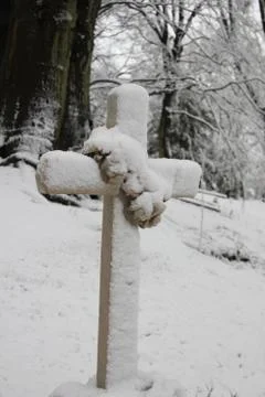 Snow covered headstone Stock Photos