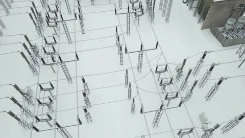 Snow Covered High Voltage Electrical Substation With Insulators Winter Aerial Stock Footage 328816255