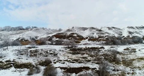 Snow covered hills Stock Footage 128172269