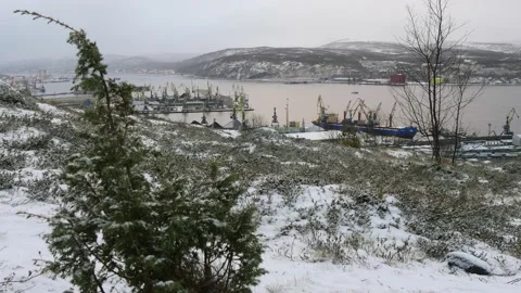 Snow-covered hillside on the background of the Bay and port. Stock Footage 143215170
