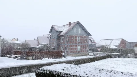 A snow covered house in the winter time Video stock 147347122