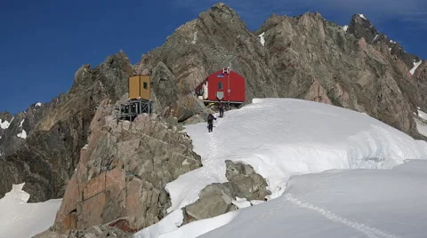 Snow covered hut on mountain side in New Zealand Video stock 55539464