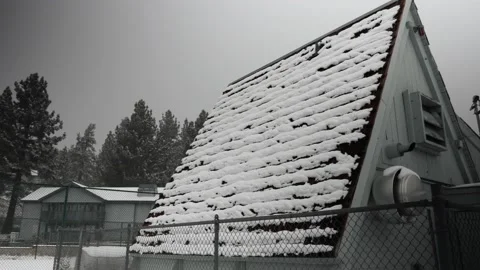Snow Covered Hut in Yosemite During Snow Storm, Gimbal Pan Shot Stock Footage 145464384