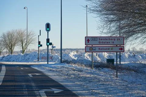 Snow Covered Intersection and Traffic Lights After Winter Storm Elli 2026 写真素材