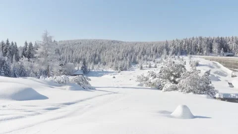 Snow-covered landscape with a forest - view from a slope Stock Footage 158082272