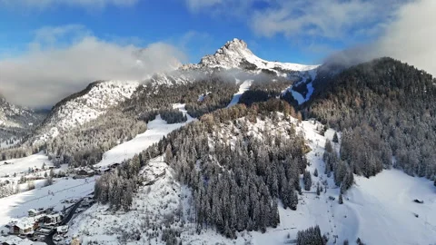 Snow-Covered Mountain Amongst Clouds Stock Footage 262227357