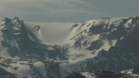 Snow-covered mountain cirque and rocky peaks, Kazakhstan Stock Footage 333953356