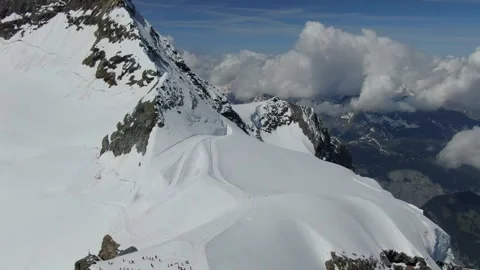 Snow-covered mountain landscape viewed from above at midday Video stock 320293393