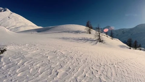 Snow covered mountain landscape in the winter season. outdoors holiday activity Stock Footage 72878669