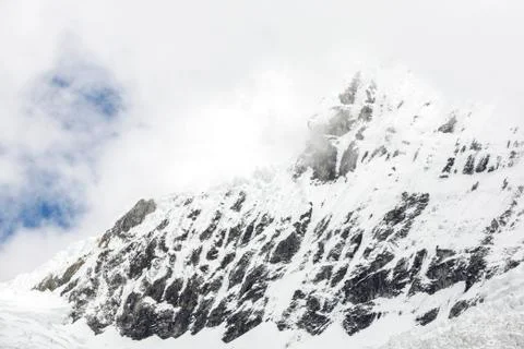 Snow covered mountain peak in the Cordillera Blanca, Peru Stock Photos