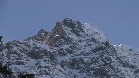 Snow-covered mountain peak Video stock 10787627