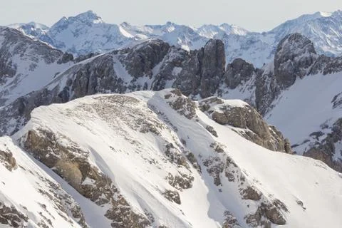 Snow covered mountain peak Stock Photos