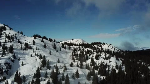 A snow-covered mountain range in Alpes-Belledonne, France Stock Footage 301371539