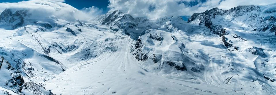 Snow covered Mountain Range Landscape in the Swiss Alps near Jungfrau Stock Photos