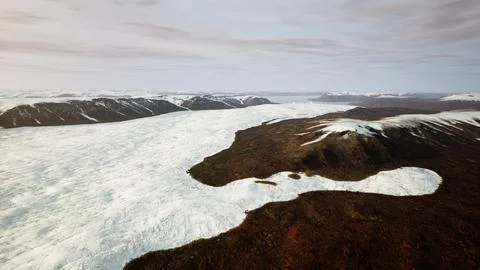 A snow-covered mountain range seen from above Ilustração Stock