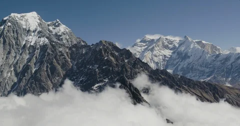 Snow covered mountain ranges during winter Stock Footage 145265244