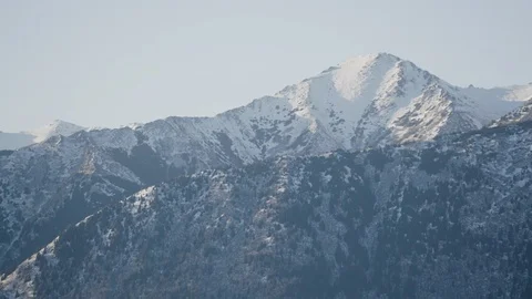 Snow covered mountain ranges Stock Footage 145275737
