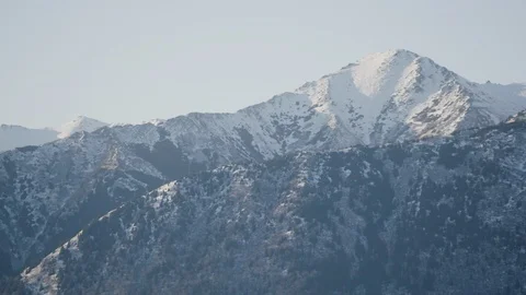 Snow covered mountain ranges Stock Footage 145275823