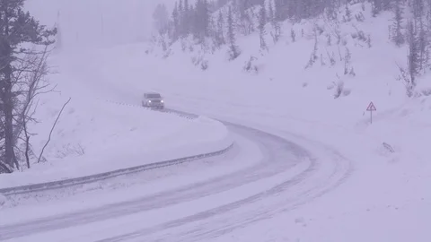 Snow-covered mountain road in winter. Stock Footage 72893680