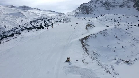A snow covered mountain with a ski slope Stock Footage 330533054