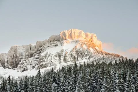 Snow covered mountain sunset Stock Photos