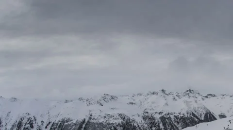 Snow covered mountain tops bad weather Tirol Alps HD Stock Footage 35509679