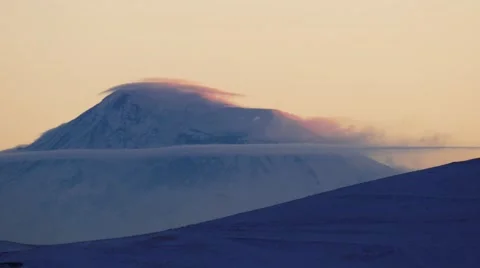Snow Covered Mountain with Wispy Clouds 動画素材 58687516