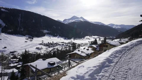 Snow-covered mountains above the alpine town of Davos Stock Footage 345283525
