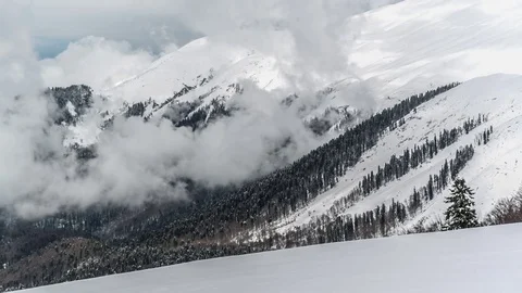 Snow-Covered Mountains And Clouds Timelapse Stock-Footage 83692952