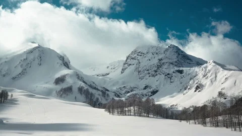 Snow-Covered Mountains And Clouds Forest. Winter highland  landscape Stock Footage 88044345
