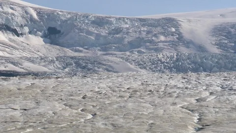 Snow covered mountains and landscape on a sunny day Stock Footage 99080251