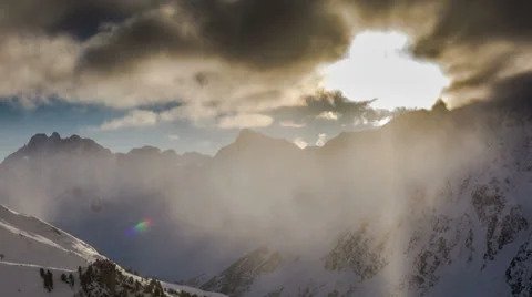 Snow covered mountains clouds and sun evening in Tirol Austria 4K Stock Footage 35737988