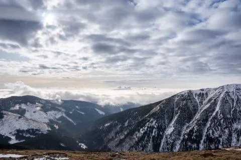 Snow covered mountains with clouds and mist in valley, Low Tatras Dumbier, Sl Stock Photos