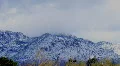 Snow covered mountains in the desert - 1 - Time Lapse HD Footage