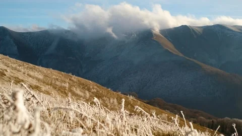 Snow-Covered Mountains Under Cloudy Sky Vídeos de archivo 293197909