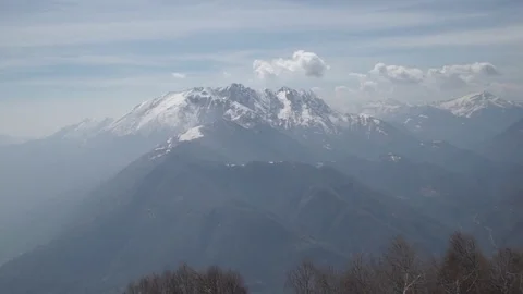 Snow covered mountains on a winter day 스톡 동영상 76046570
