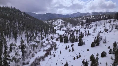 Snow covered mountains in winter Stock Footage 248002529