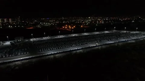 Snow-Covered Night Parking. A Large Number Of Cars. Aerial View. Stock Footage 182298233