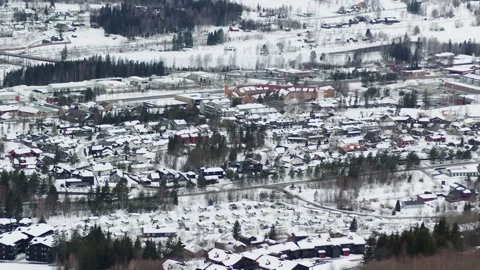 Snow-covered Oyer village below Hafjell ski resort, Norway Stock Footage 240439846