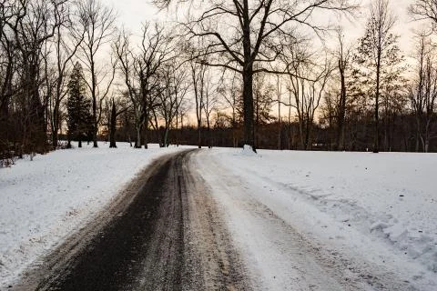 Snow covered park path Stock Photos