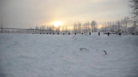 Snow Covered Park at Sun Down 02 Stock Footage 239508064