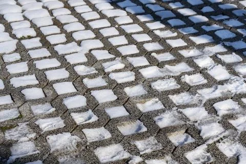 Snow Covered Pavement Pattern in Winter Light 写真素材