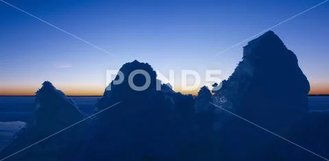 Snow Covered Peaked Rocks At Pigeon Lake In Winter, Alberta, Canada Stock Photos