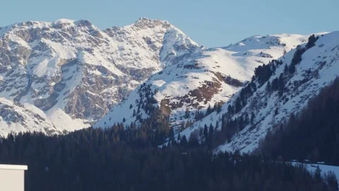 Snow-covered peaks above the Davos valley Stock Footage 345299352