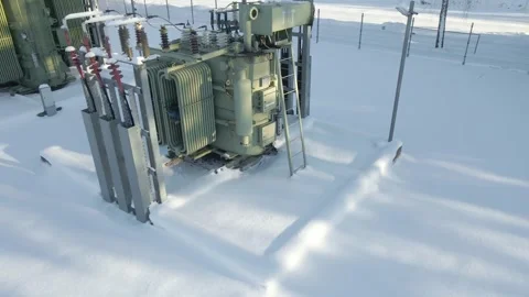 Snow Covered Power Transformer at Electrical Substation Winter Energy Stock Footage 330862972