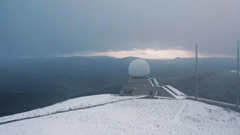 Snow-Covered Radar Dome on Mountain Summit Stock Footage 299753607