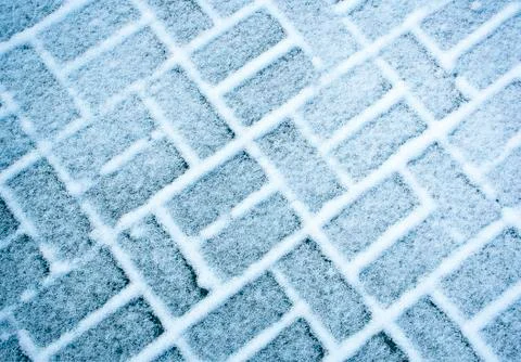 Snow covered rectangular paving Stock Photos
