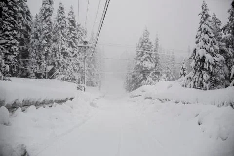 Snow covered remote road Stock Photos