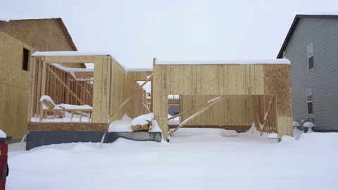 Snow Covered Residential Construction Framing Site Stock Footage 346195398